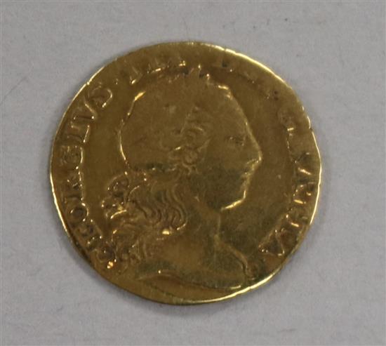 A George III gold quarter guinea, 1762, 2g, F